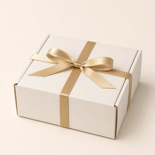 Caja de envio con lazo dorado